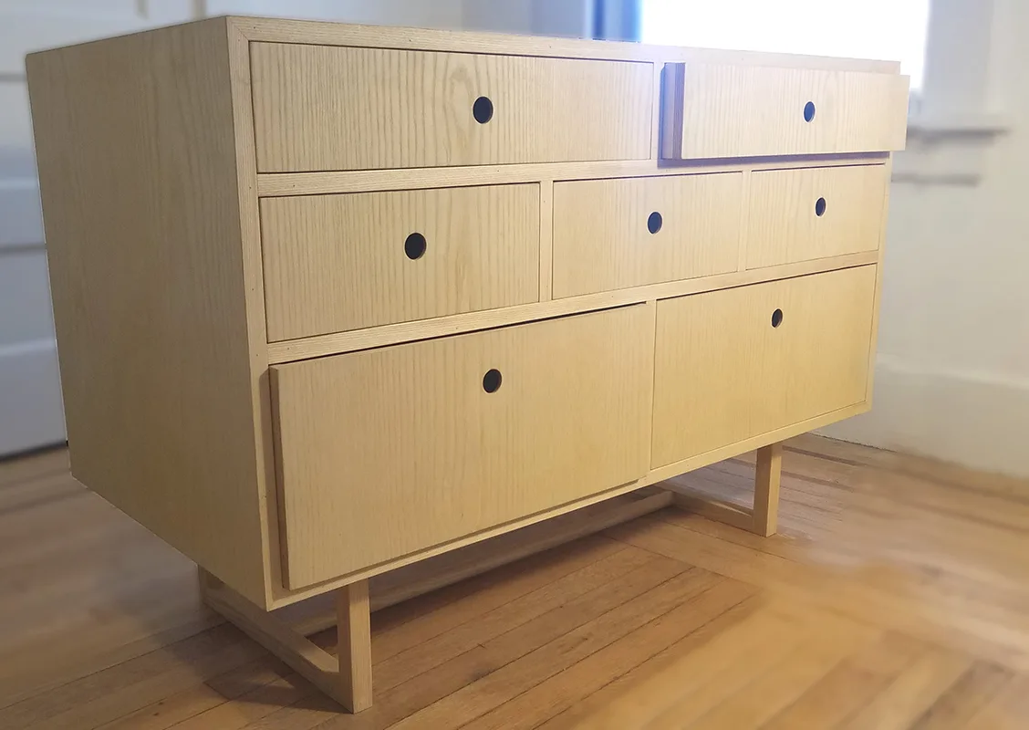 Ash dresser with seven drawers, round finger pulls and a sled base — furniture and millwork designed and built by Jack Rusk (Oakland and Los Angeles, 2013–2018)